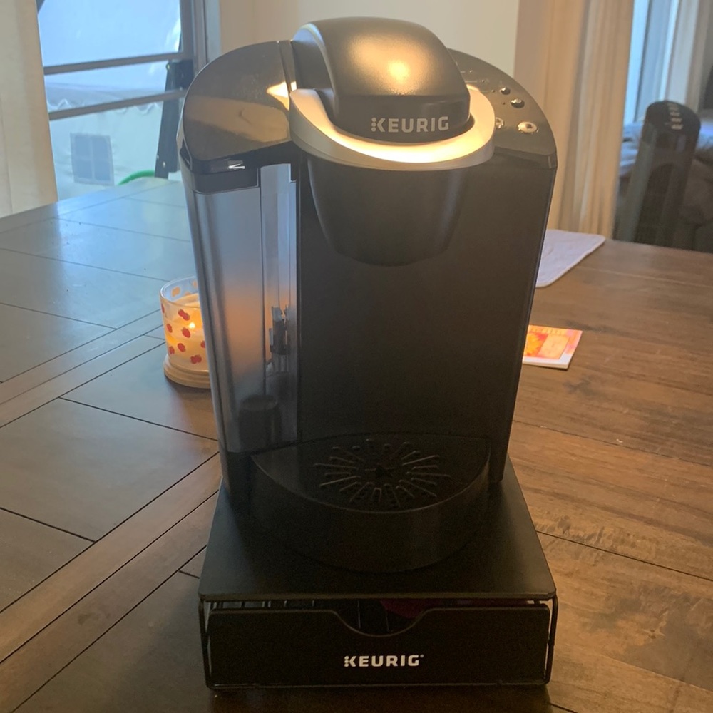 Black Keurig with black K cup holder also includes 4 purple reusable K cups